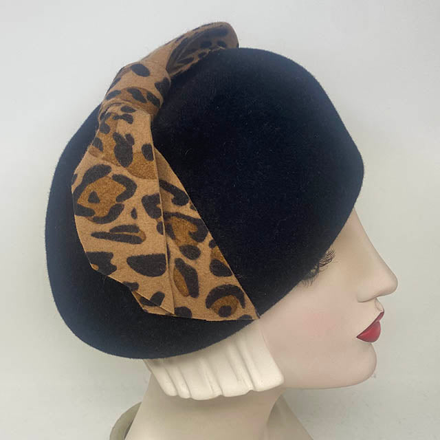 Cynthia with Leopard Bow