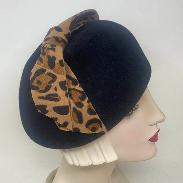 Cynthia with Leopard Bow